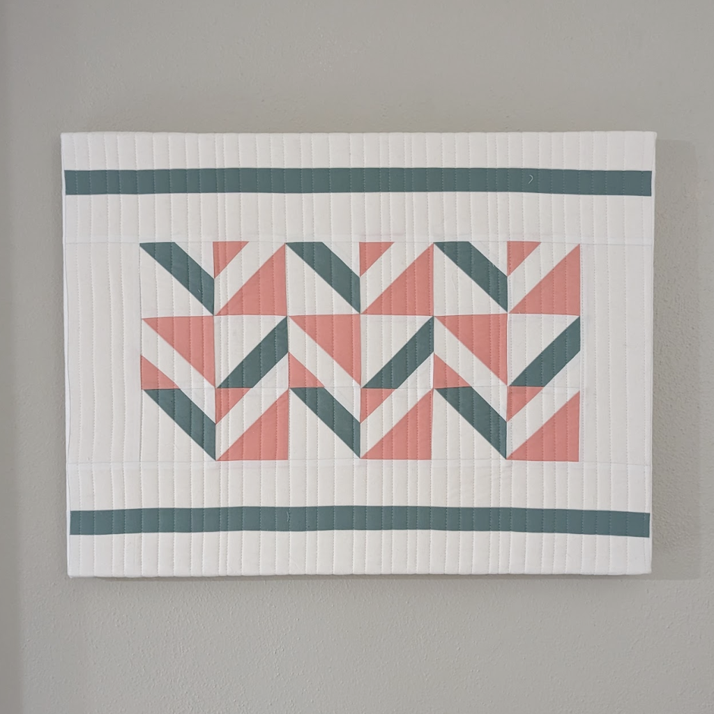 How to Mount a Wall Hanging onto Canvas - Patchwork Sampler